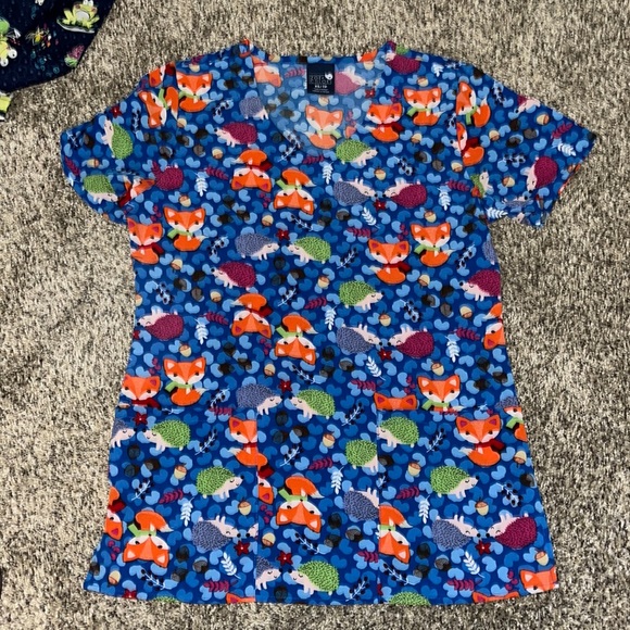 New scrub top. Never worn. - Picture 1 of 2